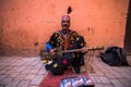 TStreet musician in traditional clothing on street Royalty Free Stock Photo