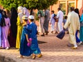 Two kids going to the prayer of Aid Al Adha 2022 in Marrakech, Morocco
