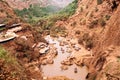 Marrakech, Morocco, september 16, 2019: Zenith view of the lake of Ouzoud waterfall in an arid terrain with people visiting it