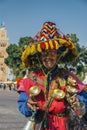 MARRAKESH, MOROCCO - JANUARY 17, 2019: Colorful water bearer in. Marrakech, Morocco