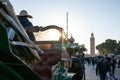 Marrakesh, Morocco - January 2019 : horse-drawn carriage cab waiting for passengers for tour in Jemaa el Fna square Royalty Free Stock Photo