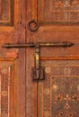 Morocco, Marrakesh. Detail of a medieval painted wooden door panels and lock Islamic - Arabesque style Royalty Free Stock Photo