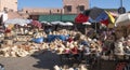 MARRAKESH, MOROCCO- JUNE, 11, 2019: outdoor market stalls selling baskets, hats and other woven goods at marrakesh