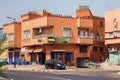 MARRAKESH, MOROCCO - JUNE 03, 2017: View of the typical red walls residential buildings in Marrakech on a sunny day