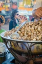 Marrakesh, Morocco - September 05 2013: Boiled snails cooked in large pot and sold as snack on Jamaa el Fna square