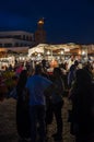 Marrakesh, Morocco - September 05 2013: Food stands with smoke and light on famous Jamaa el Fna square in evening