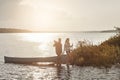 Marriage is all about teamwork. a young couple going for a canoe ride on the lake.