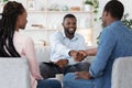 Thankful Black Couple And Marital Therapist Shaking Hands After Successful Meeting Royalty Free Stock Photo