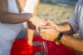 Marriage Proposal at sunset tropical beach Royalty Free Stock Photo