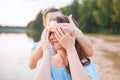 Marriage proposal on sunset . young man makes a proposal of betrothal to his girlfriend on the beach Royalty Free Stock Photo