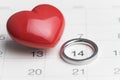 Marriage ring on nuber 14 calendar with red heart shape using as