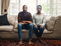 Marriage is a serious commitment. Full length shot of a young couple looking serious and sitting alongside each other on Royalty Free Stock Photo