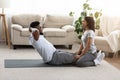 Married African Couple Doing Fitness Training At Home Together Royalty Free Stock Photo