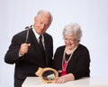 Married Couple Breaking the Piggy Bank for Retirement Royalty Free Stock Photo