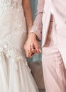 Married couple bride and groom holding hands in wedding ceremony for marriage concept Royalty Free Stock Photo