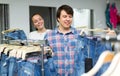 Married couple choosing blue jeans Royalty Free Stock Photo