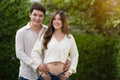 Married couple is expecting baby. man embraces his pregnant wife Royalty Free Stock Photo