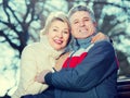 Married couple sitting on park bench Royalty Free Stock Photo