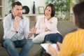 married couple talking while sitting on therapy session Royalty Free Stock Photo
