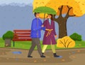 Married couple walks in autumn rainy nature. City park, trees, strong wind, rain, autumn weather