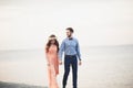 Married wedding couple standing on a wharf over the sea Royalty Free Stock Photo