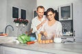 Marrieds prepare breakfast together Royalty Free Stock Photo