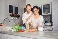 Marrieds prepare breakfast together Royalty Free Stock Photo