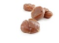 Marron glaces on white background. They are a confections made of chestnut candied in sugar syrup and glazed.