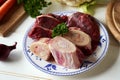 Marrow bones and vegetables - Ingredients for preparing beef bone broth or soup Royalty Free Stock Photo