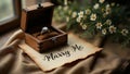 a Marry Me note on aged parchment, bathed in soft light, evoking warmth and timeless love Royalty Free Stock Photo