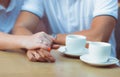 Marry me today and everyday. Close up picture of a couple`s hand with golden rings holding each other, wedding picture.