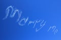 Marry me skywriting in blue sky