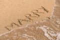 Marry Me Word On Sunny Summer Beach Sand Royalty Free Stock Photo