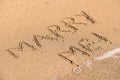 Marry Me Word On Sunny Summer Beach Sand Royalty Free Stock Photo