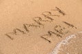 Marry Me Word On Sunny Summer Beach Sand Royalty Free Stock Photo