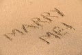 Marry Me Word On Sunny Summer Beach Sand Royalty Free Stock Photo