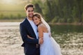 Marrying her is the best decision I ever made. an affectionate bride and groom outside on their wedding day.