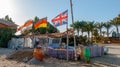 MARS ALAMA, EGYPT - MARCH 03, 2019: Gazebo for tourists on the Red Sea near the bar, for eating and relaxing, flags on flagpoles, Royalty Free Stock Photo