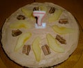 A birthday Chocolate-Bar-Pear-Cake for the seventh birthday Royalty Free Stock Photo