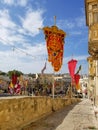 Marsa, Malta - May 2018: Festively decorated street with flags for annual festa religious holiday