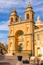 Marsaxlokk fishing village in Malta and Sanctuary of Our Lady of Pompei parish church Royalty Free Stock Photo