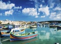 Marsaxlokk harbour and traditional mediterranean fishing boats i