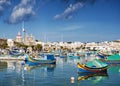 Marsaxlokk harbour and traditional mediterranean fishing boats i