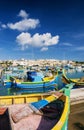 Marsaxlokk harbour and traditional mediterranean fishing boats i