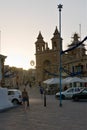 Marsaxlokk, Malta, August 2019. Sunset over the main cathedral and central square. Royalty Free Stock Photo