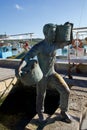 MARSAXLOKK, MALTA - JAN 02sn, 2020: Fisher mam sculpture at Marsaxlokk fish market is a very popular attraction outdoor Royalty Free Stock Photo