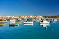 Marsaxlokk, Malta - January 10, 2020: Traditional fishing boats in the Mediterranean Village of Marsaxlokk, Malta Royalty Free Stock Photo