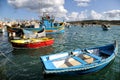 Multicolored traditional fishing boats of Luzzu