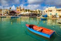 Marsaxlokk, Malta - Traditional colorful maltese Luzzu fisherboat at the old village of Marsaxlokk