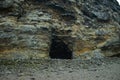 Cliff Caves on Rocky Beach Royalty Free Stock Photo